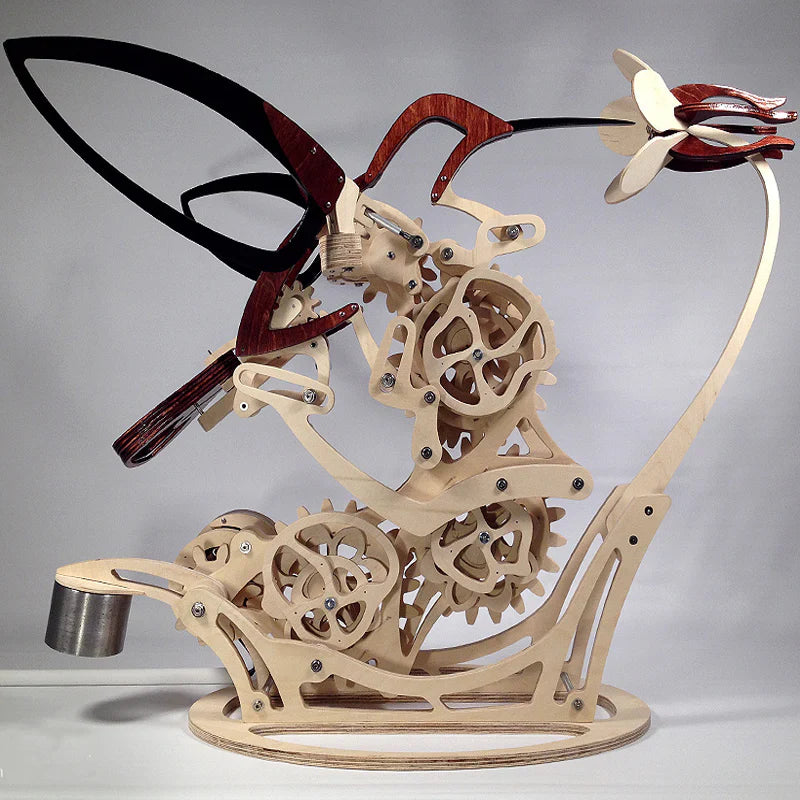 Sculpture Cinétique en Bois de Colibri - le Mouvement Rencontre L' Art