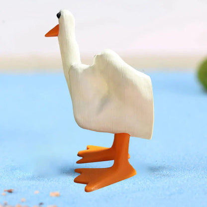 Figure de Canard Audacieuse pour le Jardin